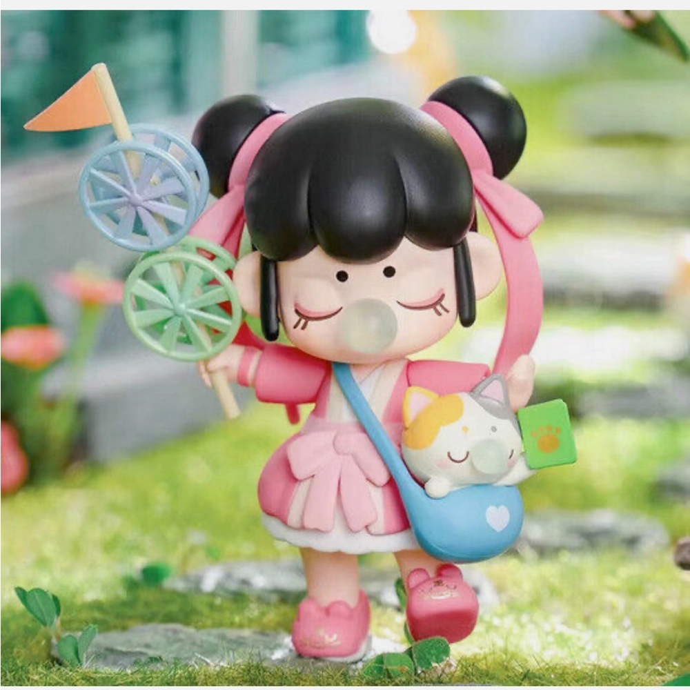 Nanci “After School” Year of the Golden Hairpin Figurine